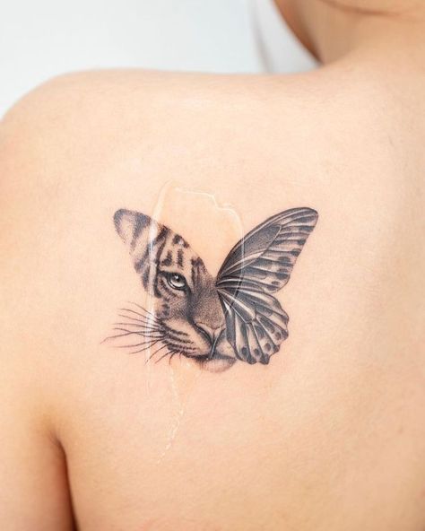 #ElegantTattoos #FineLineTattoo #ChicTattoos #ArtisticInk #SophisticatedTattoo #DelicateTattoo #MinimalistTattoo #ElegantInk #StylishTattoos #ElegantBodyArt Tiger Butterfly Tattoo, Lioness Tattoo, Chic Tattoo, Tiger Tattoo Design, Anklet Tattoos, Clever Tattoos, Tasteful Tattoos, Tatuaje A Color, Minimalist Tattoos