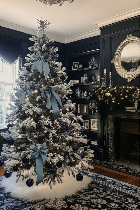 Dreaming of a frosty, winter wonderland? A black Christmas tree with icy blue and silver ornaments captures that cool, wintry magic. Blue-tinted lights and glitter accents add to the frosty feel, making your tree a true statement piece. It’s perfect for a modern, winter-inspired look. Would you love this cool vibe? Black Tree With Blue Ornaments, Blue Light Christmas Tree, Dark Blue Christmas Decor, Masculine Christmas Tree, Blue And Silver Christmas Tree Ideas, Blue Silver Christmas Tree, Blue And Silver Christmas Tree, Navy Christmas Tree, Dark Blue Christmas