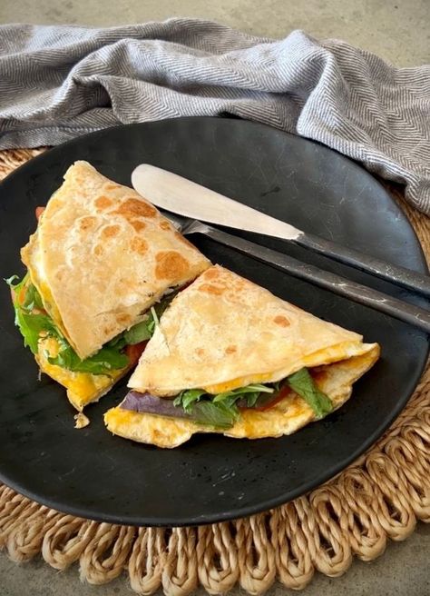 This Tortilla Omelette Wrap is the simplest most delicious breakfast, snack or light meal. It is such a versatile recipe, so add in your favourite fillings, sauces and condiments to suit your tastes and dietary requirements. Omelette Wrap Recipe, Tortilla Breakfast, Omelette Wrap, Omlet Tortilla Breakfast Wrap, Omelette Tortilla, Tortilla Omelette, Egg Breakfast Wrap Tortillas, Tortilla Omelette Wrap, Tortilla Potato Spanish Omelette