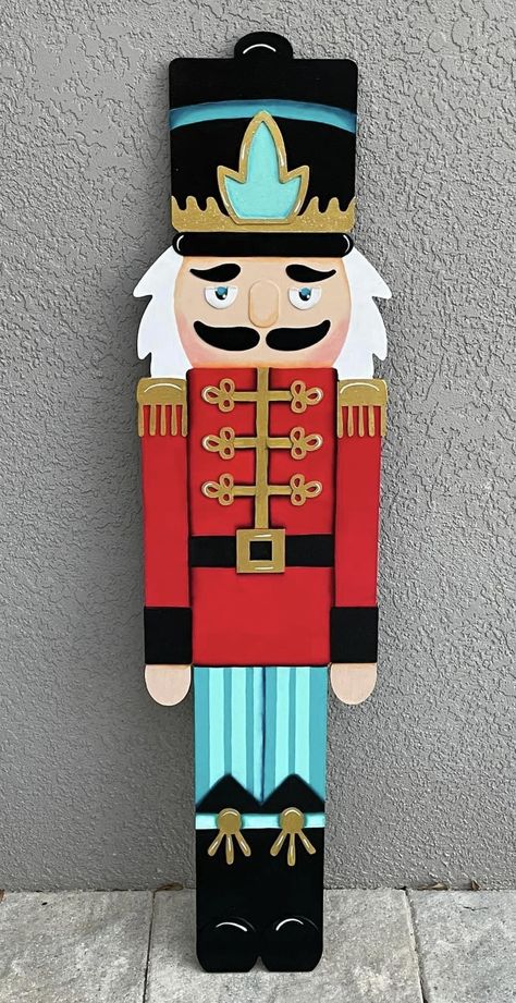 Nutcracker Diy Wooden, Christmas Crafts Nutcracker, Michaels Wooden Nutcracker, Nutcracker Wood Sign, Wooden Soldiers Christmas Diy, Nut Crackers Diy, Nutcracker Wood Cutout, Wood Nutcracker Painting Ideas, How To Paint A Nutcracker On Wood