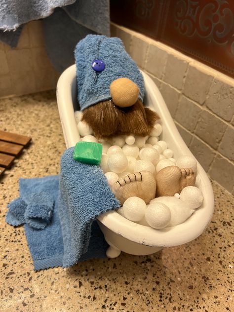 Used Dollar tree garden tin, painted white, for tub. Bubbles are cotten balls and small styrofoamballs. Gnome is a paper cone wrapped in towel with cotton stuffed nylon for nose and beard hair. Cut a piece of soap and made slippers with towel covered cardboard. Feet are nylon covered cotton, threaded for toes. Bathroom Gnome, Dollar Tree Garden, Christmas Decorations Diy Crafts, Small Tub, Tree Garden, Beard Hair, Paper Cones, Candy Land Theme, Gnome Patterns