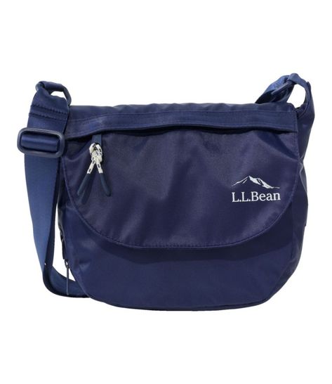 Our incredibly versatile expandable crossbody bag gives you an extra 2" of capacity with a quick unzip. Perfect for trips or just toting your everyday essentials. Spot clean. 330-denier nylon twill is Bluesign®-approved to help offset impact on the environment. Two outside zip pockets, including one fleece-lined pocket for sunglasses or a phone. Expandable bottom can be easily unzipped to increase overall capacity of bag. Adjustable shoulder strap for over-the-shoulder or crossbody carrying. Ref Crossbody Bags For Travel, Kids Outerwear, Shop Mens Clothing, Travel Tote, Boots And Sneakers, Everyday Bag, Ll Bean, Everyday Essentials, L L Bean