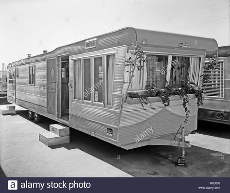 Download this stock image: 1950s MOBILE HOME IN TRAILER PARK - by007177 CAM001 HARS OLD FASHIONED - M65668 from Alamy's library of millions of high resolution stock photos, illustrations and vectors. Moble Homes, Vintage Trailers For Sale, Vintage Campers, Trailer Home, Vintage Trailers, Mobile Homes, Trailer Park, Trailers For Sale, Vintage Camper