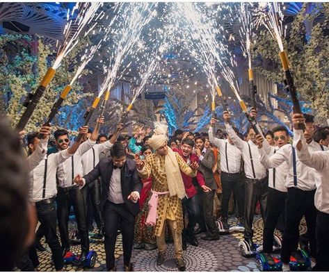 Indian groom entry ideas | Groom enters with his batsmen with cold pyro shots and hand held gerbs | Curated by witty vows Cold Pyro Entry, Indian Groom Entry, Groom Entry Ideas, Karan Grover, Wedding Entry, Groom Entry, Bride Entry, Band Tattoo Designs, Wedding Entrance Decor