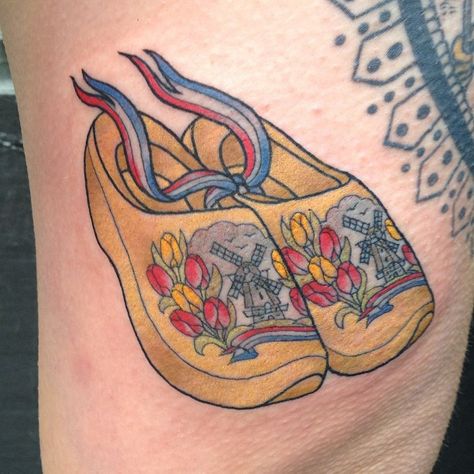 omg, shoes Clog Tattoo Dutch, Dutch Shoes Tattoo, Dutch Heritage Tattoo, Swedish Flag Tattoo, Clog Tattoo, Dutch Tattoo Ideas, Grandparent Tattoo, Windmill Tattoo, Dutch Tattoo