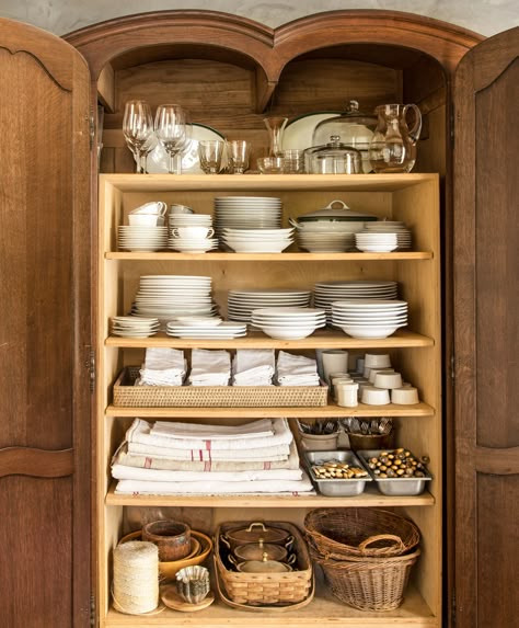 The French armoire in the cookhouse pantry was retrofitted with simple pine shelves to house Kurt's impressive collection of white dinnerware, enamel cutlery, and antique linens. Organize Life, Pine Shelves, Wild Hare, French Armoire, Pretty Dishes, Farm Cottage, Antique Dishes, White Dinnerware, Dream Kitchens