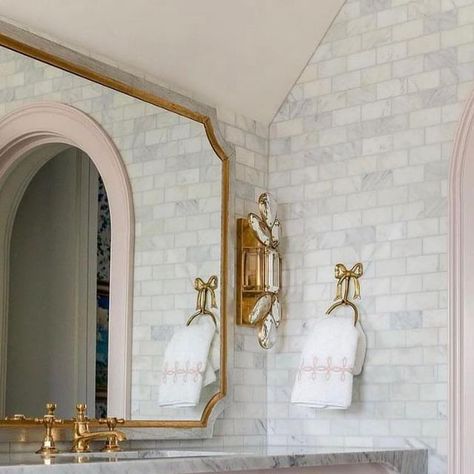 Laurie Smith on Instagram: "Beautiful bath by Utah designer @the_fox_group_ Not only is the soft pink alluring, but the scalloped shape of the marble countertop mimics the drawer profile and arched door. The bow hardware makes it an undeniably feminine space. 📸: @lindsay_salazar_photography Design/Build credit: @the_fox_group_ #interiordesign #interiorinspiration #interiorinspo #interiorinspirations #interiorinsights #interiorteaching #designteacher #architecturaldetail #designsolutions #bathroomdesign" Baby Girl Bathroom, Owners Bathroom, The Fox Group, Fox Group, Nursery Ideas Neutral, Kids Bathroom Remodel, Built In Vanity, Girl Bathroom, M Girl