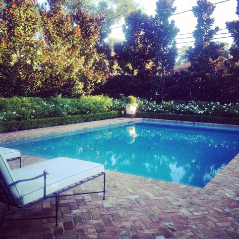 Brick lined pool, magnolias, roses | Boxwood Interiors Old Chicago Brick Around Pool, Stone Pool Deck, Quarry House, Nashville House, Swimming Pool Pond, Chicago Brick, Pool Pond, Red Brick House, Ideas Casa