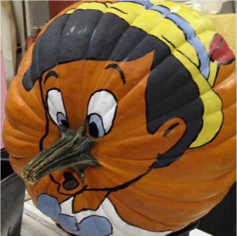 This witty painted pumpkin uses its stem as a convincing stand-in for Pinocchio's growing nose. - WomansDay.com Disney Pumpkin Painting, Creative Pumpkin Painting, Creative Pumpkin Decorating, Character Pumpkins, Scary Halloween Decorations Diy, Pumpkin Decorating Contest, No Carve Pumpkin Decorating, Halloween Decor Diy, Disney Pumpkin