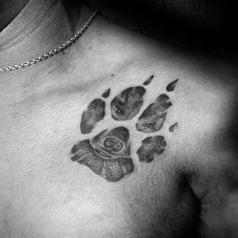 Upper Chest Animal Dog Paw Print Mens Tattoo Ideas Dog Print Tattoo, Pawprint Tattoo, Dog Paw Tattoo, Kunst Tattoos, Mens Shoulder Tattoo, Paw Tattoo, Wolf Tattoos, Dog Paw Print, Dog Tattoo