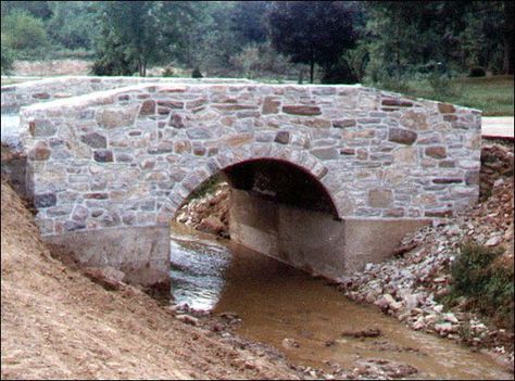 Moat (river/stream) with an elegant bridge over it. No need for Driveway Culvert, Backyard Bridges, Stone Driveway, Driveway Entrance, Driveway Design, Driveway Landscaping, Hillside Landscaping, Stone Bridge, Old Stone