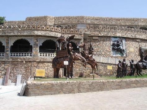 Haldighati is located at a distance of 40 km from Udaipur. A mountain pass in the Aravalli Range, it connects the districts of Rajsamand and Pali.Historical significance of the site is evident from the fact that the battle of Haldighati was a huge combat between Maharana Pratap of Mewar and Raja Man Singh of Amber.  Get Customized Packages for Your Amazing Holidays. Call Trip Night at 63755-14102, or drop a mail at info@tripnight.com for the customized quote. Rajmahal Palace, Banswara Rajasthan, Maharana Pratap, Forts In Maharashtra, Jagat Niwas Palace Udaipur, Rajasthan Famous Places, Mountain Pass, Your Amazing, Udaipur