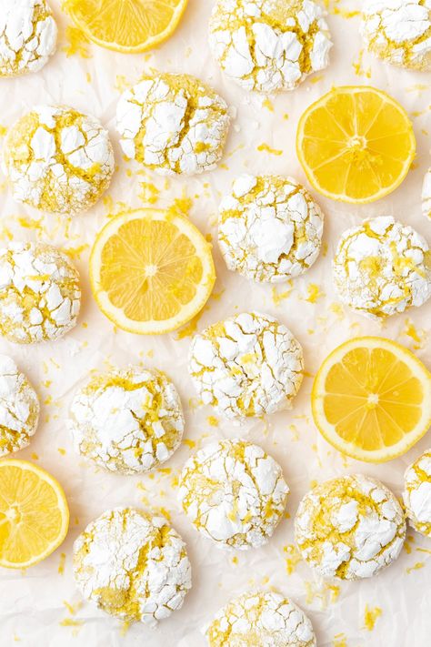 These lemon crinkle cookies are a fun twist on classic chocolate crinkles! With crispy edges and soft lemony centers, they're an easy, fun summer cookie that everyone will love! New Year Desserts Ideas, Lemon Crinkle Cookies Recipe, Snowball Cookie, Summer Corn Chowder, Pink Sangria, Summer Cookie, Christmas Baking Gifts, Berry Sangria, New Year's Desserts