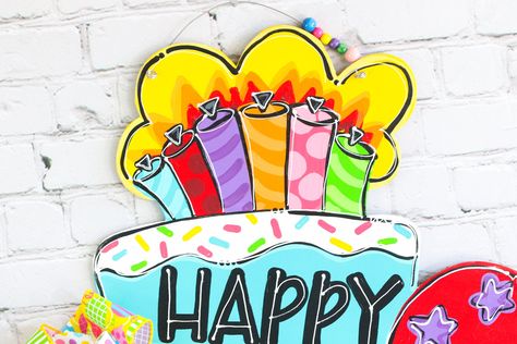 Happy birthday! Celebrate your family's birthday with this interchangeable door hanger. A brightly painted cake wishes your family a happy, happy birthday. Birthday party balloons are interchangeable and personalized with each family member's name and your choice of colors. No need for messy chalk and chalkboard paint as seen on most birthday door hangers. This option gives you a professional, personalized door hanger that is easily switched out for the birthday boy or girl. A coordinating bow a Birthday Door Hanger Wooden, Birthday Door Hanger, Interchangeable Door Hanger, Birthday Door, Birthday Party Balloons, Painted Cake, Happy Happy Birthday, Birthday Party Balloon, Painted Cakes