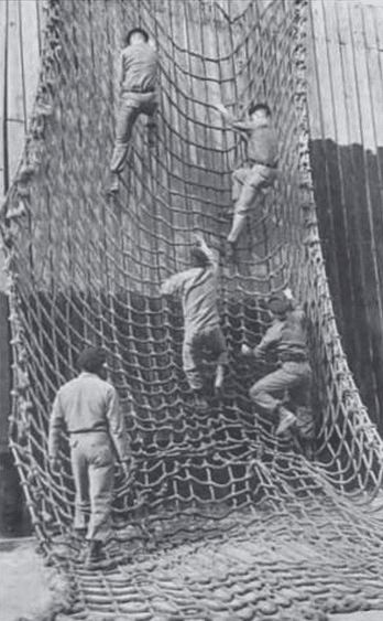 WWII 1940s fort benning army rangers cargo net Backyard Workout, Military Fitness, Backyard Gym, Church Games, Military Workout, Obstacle Course Races, Fort Benning, Obstacle Courses, American Ninja Warrior