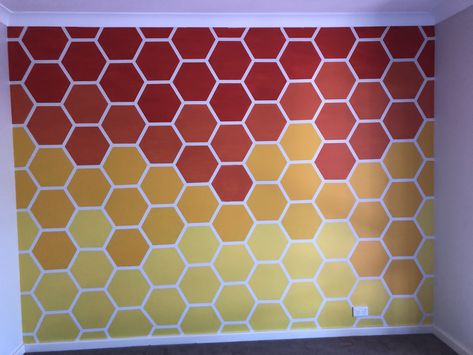 Honeycomb painted feature wall Beehive Wall Mural, Hexagon Wall Decor, Blue And Orange Living Room, Painted Feature Wall, Bee Yard, Bee Room, Geometric Wall Paint, Office Painting, Chip Art