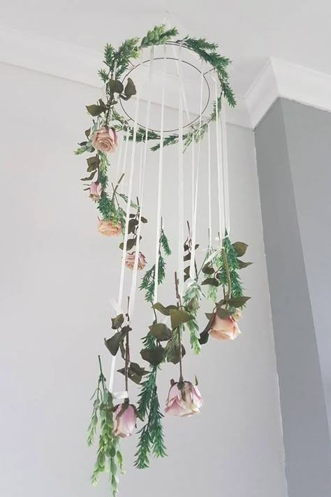 Flower Garlands - Incorporate elegance into your wedding theme with this delicate and pretty piece. These stunning artificial flowers mobiles hang from ribbon to create a beautiful and natural decoration, with lots of movement and texture. If you’ve got high ceilings or a lot of space to fill with decorations, these would work perfectly, and they’re utterly individual. #flowergarlands #flowers #weddingflowers #weddingdecor #weddingdecorations #wedding #weddingideas Floral Mobile, Mobile Wedding, Fresh Wedding Flowers, Pink Mobile, Country Garden Weddings, Garden Theme Wedding, Flower Mobile, Flowers And Greenery, Floral Chandelier