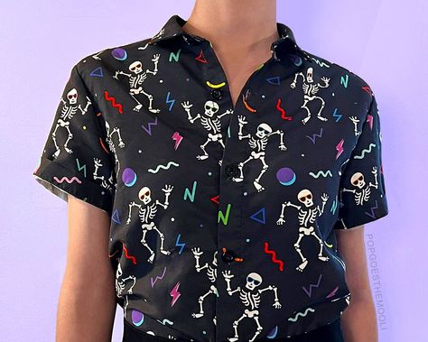 "Rock our PGTM EXCLUSIVE \"Raving Skeletons\" design on this loud all over print unisex button down aloha shirt.  PLEASE READ OUR SIZING DETAILS IN THE SECOND IMAGE OF THIS LISTING. IT'S SUPER IMPORTANT INFO DESIGNED TO HELP YOU PICK THE SIZE THAT WILL FIT BEST :) WHO IT'S FOR .:If you became the workplace legend after you and your inappropriate, tasteless ugly Christmas sweater took home the prize at the office party, then this shirt is for you! .:If you did the walk of shame after Halloween in your goofy, crazy costume, then this shirt is for you! .:If you're a Parrothead, a Margaritaville VIP, and a Jimmy Buffett devotee, then this shirt is for you! .:If you're a funny guy or gal and always the center of attention, then this shirt if for you! WHY YOU'LL LOVE IT .:super bold and fun patt Hawaiian Outfit Ideas, Hawaii Outfits Ideas, Silly Clothes, Crazy Costumes, Walk Of Shame, Weird Funny, Memphis Pattern, Hawaii Outfits, Funny Men