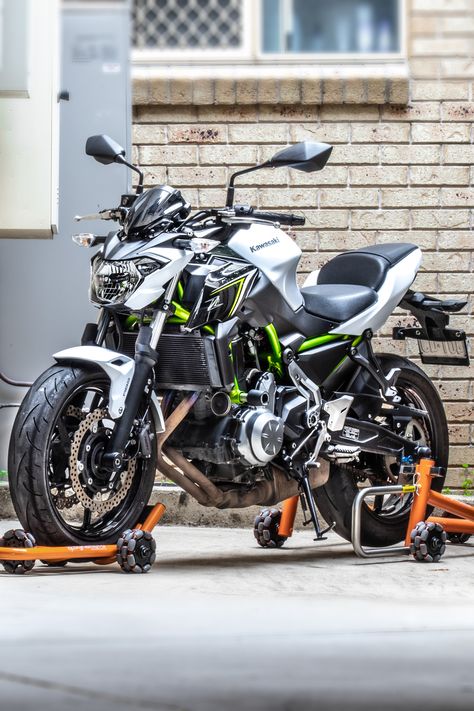 Multi-directional movement of your bike. Kawasaki Ninja Z650. Quick | Safe | Easy Movement & Storage. Motorcycle Storage Garage, Bike Kawasaki, Ninja Motorcycle, Naked Bikes, Kawasaki Z650, Cafe Racer Moto, Motorcycle Storage, Kawasaki Bikes, Storage Garage