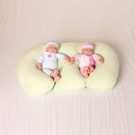 $90, amazon.com  Best for Twins  Breastfeeding twins at the same time? This pillow makes the impossible possible. Another genius as-seen-on-Shark Tank idea, sit with your back against the center cushion, and use the flexible arms to cradle your babies in the football position for tandem nursing.  - BestProducts.com Twin Pillow, Best Nursing Pillow, Twin Nursing Pillow, Tandem Nursing, Breastfeeding Twins, Boppy Nursing Pillow, Newborn Tips, Breastfeeding Mom, Stopping Breastfeeding