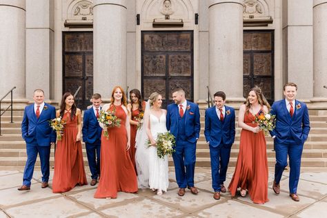 Blue And Orange Wedding Bridesmaids, Brown Orange And Blue Wedding, Blue Suit And Orange Dress, Burnt Orange And Navy Wedding Party, Blue And Orange Groomsmen Suits, Navy Blue Tuxedo Wedding Burnt Orange, Paprika And Navy Wedding, Orange And Blue Wedding Colors Colour Palettes, Blue And Orange Aesthetic Wedding