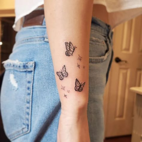 Cute monarch butterfly Butterfly Sibling Tattoo, Tattoo Ideas Butterfly And Flowers, Simple Butterfly Tattoos For Women, Forearm Tattoos Butterfly, Simple Tattoos On Forearm, 6 Butterflies Tattoo, 4 Butterfly Tattoo Designs, Butterfly Cluster Tattoo, Wrist Tattoos For Women Butterfly