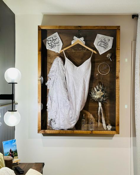 A Wedding Keepsake Worth Cherishing Forever 💍 We’re beyond excited to share something truly special and meaningful! My talented husband recently completed a one-of-a-kind project—a large, handcrafted shadow box to preserve my wedding dress and some of the most cherished items from our wedding day. ✨ This shadow box isn’t just a display—it’s a time capsule, capturing every precious moment, from the lace of my gown to sentimental tokens from our ceremony. His craftsmanship and attention to de... Wedding Dress Shadow Box Ideas, Wedding Dress Shadow Box, Shadow Box Wedding, Wedding Shadow Box, Wedding Memory Box, Goal Board, My Wedding Dress, Wedding Keepsakes, Time Capsule