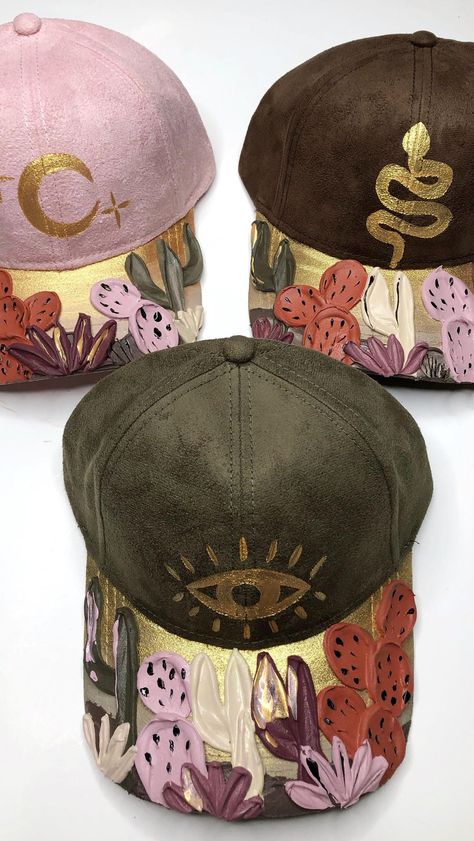 beyondthe.canvasbyyaya on Instagram: More caps coming soon! 🥰 which one stood out to you?! #hat #fedora #floralhat #floralart #baseballcap #handpaintedhats #fedora… Painting Denim, Textured Hat, Wolf Hat, Pink Patch, Hat Fedora, Painted Hats, Boho Hat, Floral Hat, Commissioned Artwork