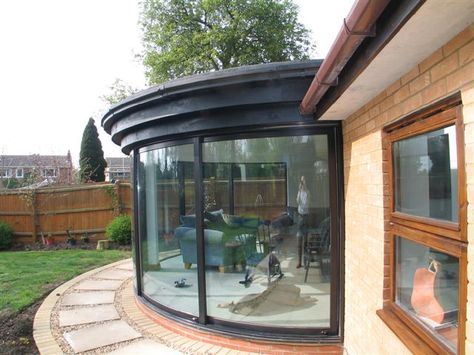 curved doors in a conservatory walton on thames in surrey Round Balcony Design Exterior, Round Conservatory, Balcony Conservatory, Semi Circle Window, All Glass Conservatory, Aluminium Conservatory, Glass Veranda Ideas Uk, Curved Door, Conservatory Extension