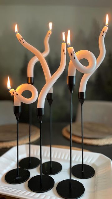 Diy Candlesticks, Halloween Decorations Candles, Spooky Candles Diy, Dollar Store Halloween Crafts, Candle Sticks, Candle Holders Diy, Diy Melted Candles Halloween, Halloween Taper Candles, Ghost Candle Sticks