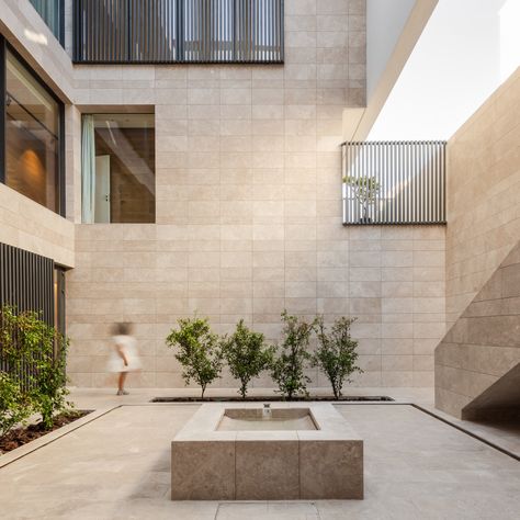 Houses in Mishref interlock around sunken stone courtyard Pool Shade, Louver Windows, Pale Wood, Floating Staircase, Boundary Walls, Internal Courtyard, House On The Rock, The Suburbs, Courtyard House