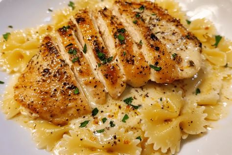 Lemon Garlic Chicken with Creamy Bowtie Pasta Creamy Bowtie Pasta, Zesty Chicken, Easy Delicious Dinners, Yummy Dishes, Lemon Garlic Chicken, Bowtie Pasta, Chicken Dish, Italian Dinner, Creamy Pasta