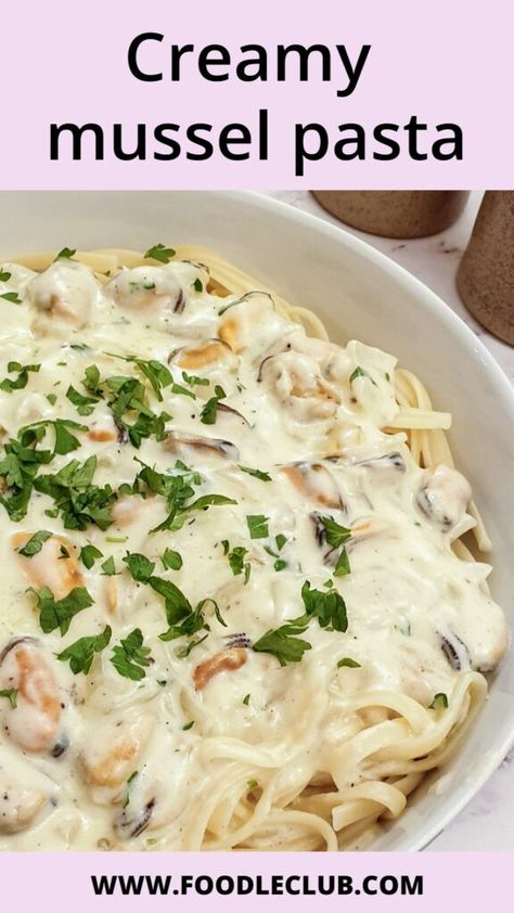 Close up of a dish of creamy mussel pasta sprinkled with parsley. Mussel Pot Recipe Creamy, Mussel Recipes Easy, Creamy Mussel Pasta, Creamy Muscles Recipe, Muscles And Pasta, Mussels And Pasta Recipes, Mussels In Cream Sauce, Recipes With Mussel Meat, Frozen Mussels Recipe Easy