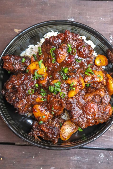 Explore the Rich and Savory Delight of Jamaican Oxtail - Meals By Alden B Jamaican Stewed Oxtails, Jerk Oxtails Jamaican Recipes Crockpot, Dutch Oven Oxtail Recipes, Oxtail Recipes Jamaican Stove Top, Oxtail Meals, Oxtail Recipes Jamaican, Jamaican Oxtail Stew, Jamaican Food Recipes, Jamaican Oxtail