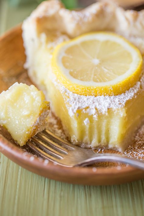 An easy and refreshing summertime dessert idea! The filling is made in the blender and uses one whole lemon! Lemon Pie With Whole Lemon, Whole Lemon Pie Recipe, Whole Lemon Pie, Lemon Blender Pie, Blender Lemon Pie Recipe, Whole Lemon Blender Cake, Easy Lemon Pie, Lemon Tart Recipe, Lemon Pie Recipe