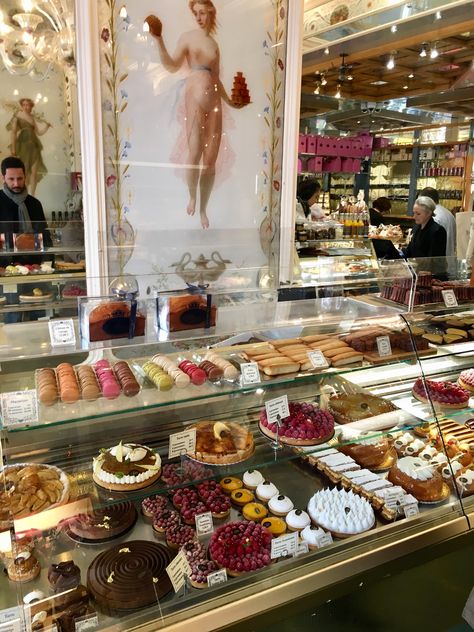 A third historic institution of the marketplace is Pâtisserie Stohrer, which has been making pastries since 1730 (making it the oldest pâtisserie in Paris)! It was founded by Nicolas Stohrer, the Polish baker for Marie Leszczynska who was the daughter of King Stanislas of Poland and who married into the French court via Louis XV. He was brought along by the new queen so that she could continue to enjoy his pastries. Today, we can enjoy them too. Stohrer offers his original creation “baba au rhum Paris Patisserie Aesthetic, Stohrer Paris, Making Pastries, Paris Pastries, Petite Fours, Paris Bakery, Daughter Of King, Maid Cafe, Versailles Garden