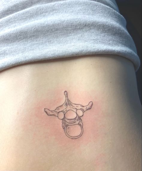 #fineline #singleneedletattoo #backtattoo #tattooideas #lowerbacktattoos #decent Tattoo Of Vertebrae, Anatomy Inspired Tattoos, Sphenoid Bone Tattoo, Small Anatomy Tattoos, Larynx Tattoo, Vertebra Tattoo, Radiology Tattoo, Vertebrae Tattoo, Thyroid Tattoo