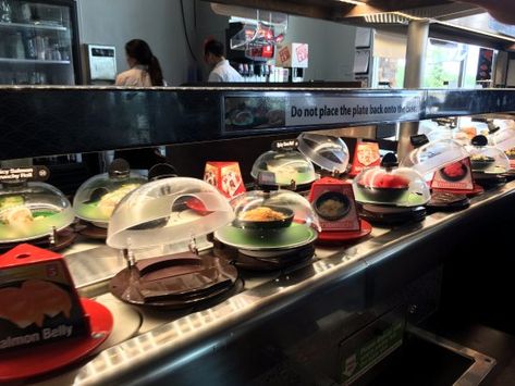 Sushi Restaurant Photography, Sushi Restraunt, Revolving Sushi Bar, Revolving Sushi, Japan Sushi Restaurant, Japan Sushi Restaurant Aesthetic, Buffet Style, Texas Roadtrip, Styling A Buffet