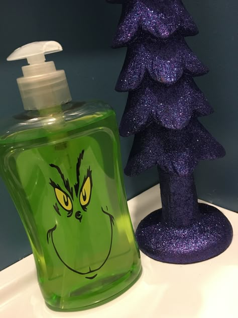 Grinch soap bottle I made for my kids bathroom❤️ Grinch Diy Gifts, Grinch Christmas Bathroom Ideas, Grinch Xmas Decor, Grinch Bathroom Decorations, Grinch Christmas Decorations Bathroom, Diy Grinch Bathroom, Grinch Craft Ideas, Grinch Bathroom Ideas, The Grinch Diy