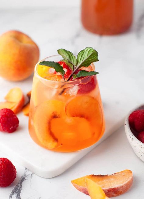 This Peach Rosé Sangria is a very easy-to-make cocktail that’s perfect for a gathering or simply sipping on a hot day! This refreshing cocktail is filled with peach flavors, and the combination of peaches and Rosé is just perfect. Bacon Ranch Cheese Ball Recipe, Rosé Sangria, Red Sangria Recipes, Sangria Ingredients, Easy To Make Cocktails, Peach Margarita, Peach Cocktail, Rose Sangria, Candy Cocktails