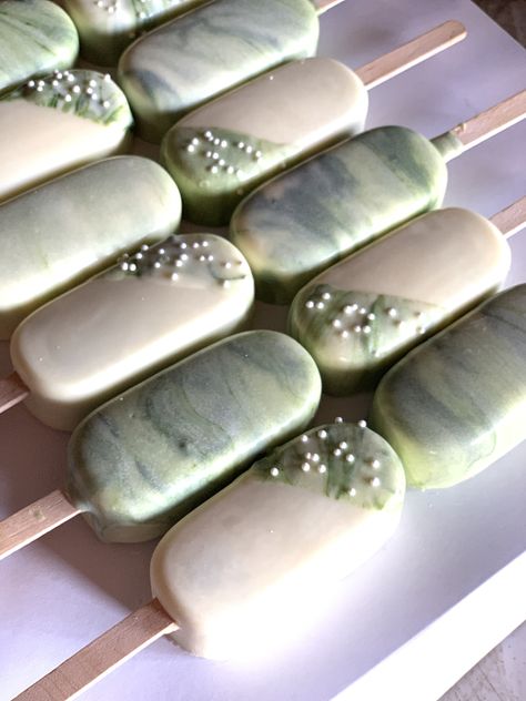 Sage Green Cakesicles, Green Sweets Table, Sage Green Desserts, Green Wedding Food, Green Cakesicles, Marble Cakesicles, Sage Green Dessert Table, Wedding Cakesicles, Safari Birthday Party Decorations