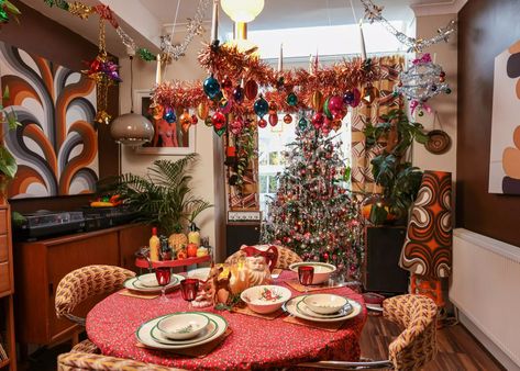 Home transformed into 70s' festive wonderland with a Quality Street theme - Wales Online 70s Holiday Party, 1970 Christmas Decorations, 70s Christmas Food, 70s Christmas, 1970 Dinner Party, 70s Christmas Ornaments, Cinderella Coach, Car Boot Sale, Quality Street