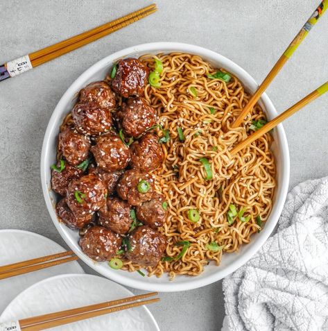 A fabulous weeknight meal is always good to have in your back pocket. The meal that takes a few minutes to prepare, but tastes like you have been slaving all day in the kitchen. This is it my friends.Easy teriyaki meatballs with ramen noodles. The sauce on the ramen takes a minute- no joke, and the teriyaki sauce is from a bottle- sometimes making things from scratch is not worth it. I am totally obsessed with ramen noodles, which pair perfectly with these meatballs. I also happened to… Meatballs And Ramen Noodles, Teriyaki Pineapple Meatballs, Easy Teriyaki Meatballs, Sesame Ramen, Pineapple Meatballs, Teriyaki Chicken Meatballs, Easy Breakfast Burritos, Teriyaki Noodles, Asian Dinner