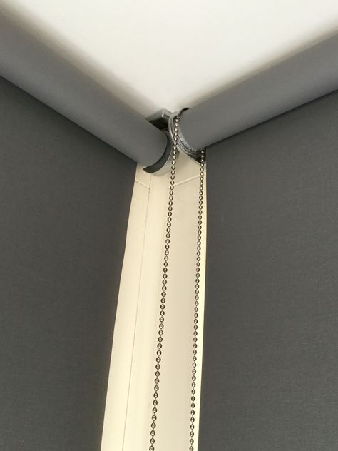 Grey roller blinds get a designer look with these chrome brackets. #designerblinds Cortinas Roller, Grey Roller Blinds, Suite Master, Shutter Blinds, Corner Window, Roller Blind, Curtains Blinds, Window Blinds, Window Trim