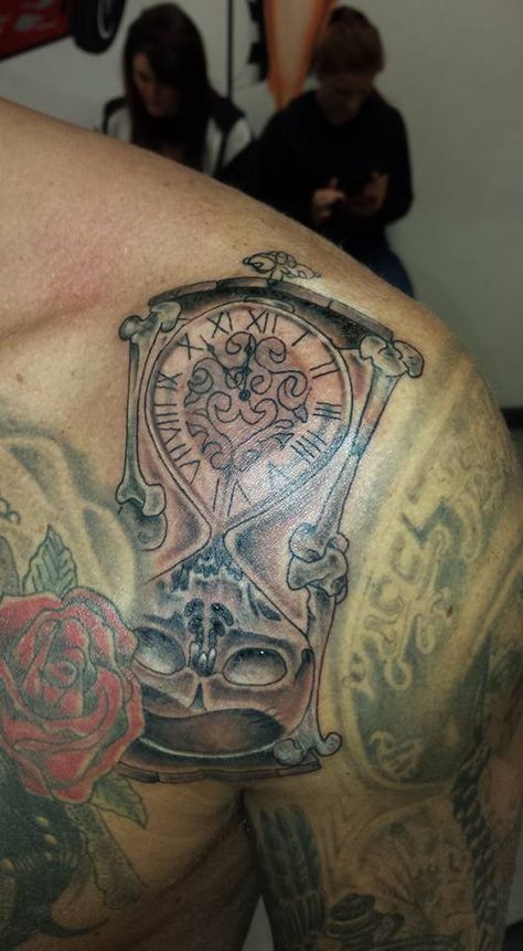 Hour glass, egg timer, tattoo, collar bone tattoo, men with tattoos, time piece, skull, black and grey shade Timer Tattoo, Tattoo Collar Bone, Men With Tattoos, Collar Bone Tattoo For Men, Bone Tattoo, Skin Tattoo, Egg Timer, Piercing Studio, Collar Bone Tattoo