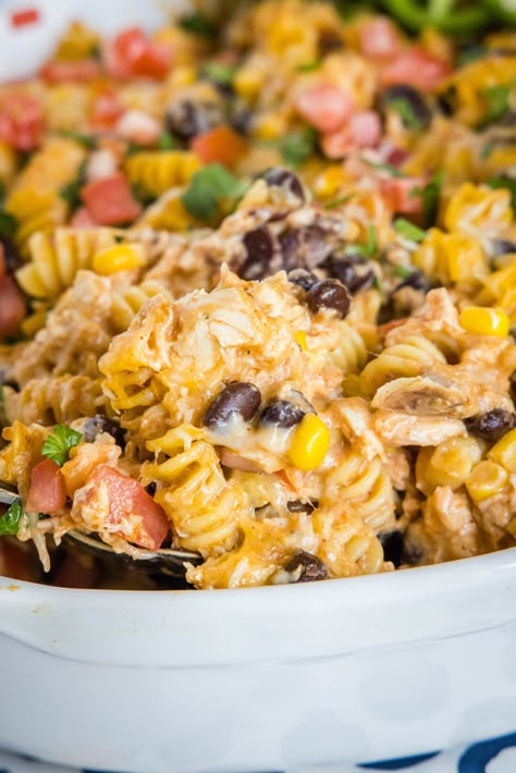 This Fiesta Chicken Casserole is loaded with all the Tex-Mex/Mexican flavors that you love, in a super quick and easy dinner you can make any night of the week. Leftover Mexican Chicken, Mexican Chicken Pasta Recipes, Mexican Make Ahead Recipes, Easy Summer Dinners On Grill, Tex Mex Dinner Ideas, Chicken Nacho Casserole, Mexican Chicken Pasta Casserole, Easy Tex Mex Recipes, Healthy Tex Mex Recipes