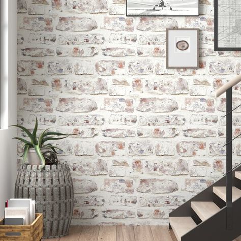 Looking to refresh a room in a space where painting just isn't an option? Wallpaper is a time-honored way to add a fresh look to space without worrying about the walls. This wallpaper showcases an aged brick and mortar pattern for an on-trend industrial look. Perfect for creating the look of a refurbished loft accent wall, this wallpaper is non-pasted and is easily strippable, so there's no need to worry about the walls underneath. Faux Brick Wallpaper, Types Of Wallpaper, Vinyl Wall Panels, White Brick Wall, Brick Wallpaper Roll, Wallpaper Galaxy, Brick Interior, Faux Brick Walls, Wall Planks