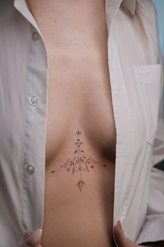 Tattoos Near Breast, Tattoos Under The Breast, Under Breast Tattoo Women, Sternum Tattoo Designs For Women, Tattoo Breast Woman, Tattoo Ideas Breast, Tattoo Around Breast, Tattoo Under The Chest, Sternum Ornamental Tattoo