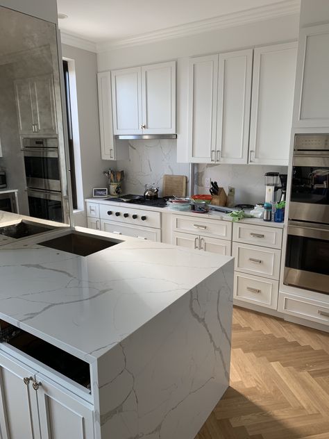 White Quartz Waterfall Countertop, Quartz Countertops Waterfall Edge, Corian Waterfall Island, Black Quartz Waterfall Island, Kitchen Island Quartz Counter Tops Waterfall, Quartz Kitchen Countertops White, Mirrored Tile, Brooklyn Kitchen, Quartz Backsplash