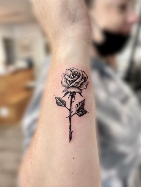 Single Rose Stem Tattoo, Rose Tattoos With Names Stem, Black Shaded Rose Tattoo, Rose Shaded Tattoo, Masculine Rose Tattoo Men, Black And White Rose Tattoo Forearm, Solid Black Rose Tattoo, Rose And Stem Tattoo Design, Rose Shading Tattoo